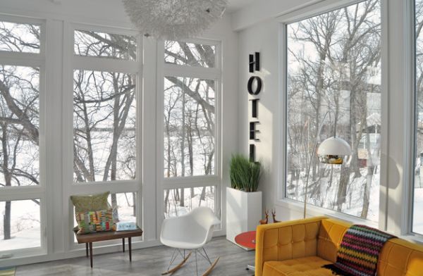 Sunroom with floor lamp offers a lovely little nook to escape from the rush