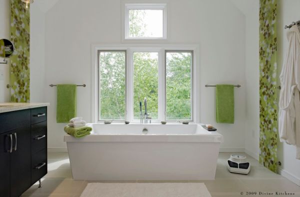 Touch of green in breathes freshness into a white bathroom