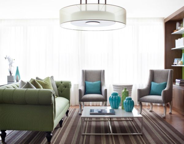 Turquoise blue and lovely green cushions provide the accent shades