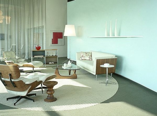 Twin Eames Loungers in white ash seem perfect for this relaxed family room