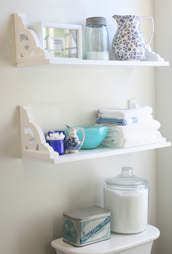 white wooden bathroom shelves