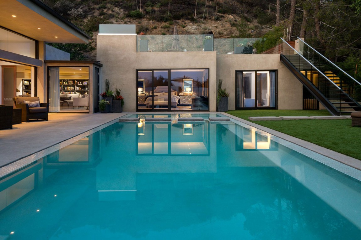 bedroom with pool view