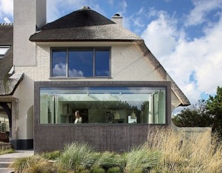 Rustic Dutch Seaside Residence Gets a Modern Makeover Capped With a Thatched Top