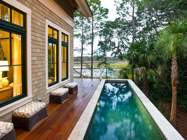 modern wooden deck with pool