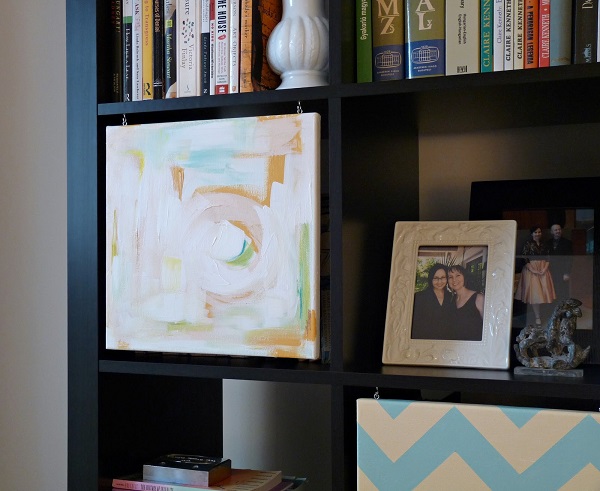 Canvas bookshelf storage with hanging canvas