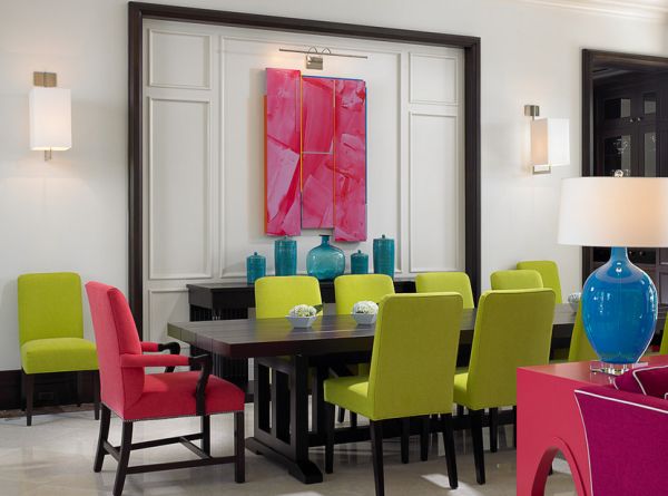 Exquisite dining space laced with fuchsia, turquoise and lime green