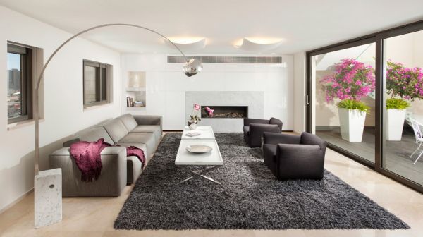 Exqusite living room in white and grey with the Arco floor lamp