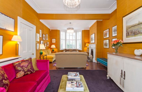 Fuchsia and tiger eye orange give this family room an inimitable look!