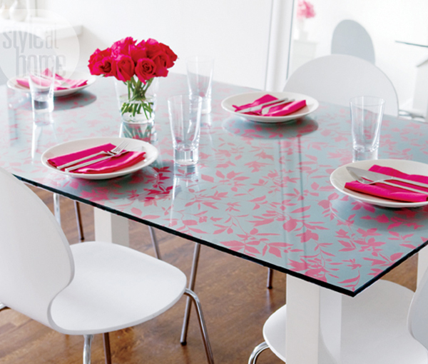 Glass dining room table with wallpaper top