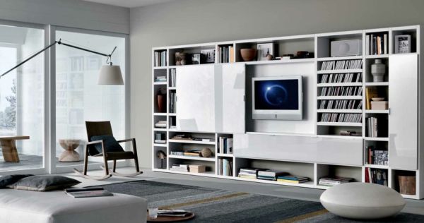 Gray presents a natural contrast to white shelves in the family room