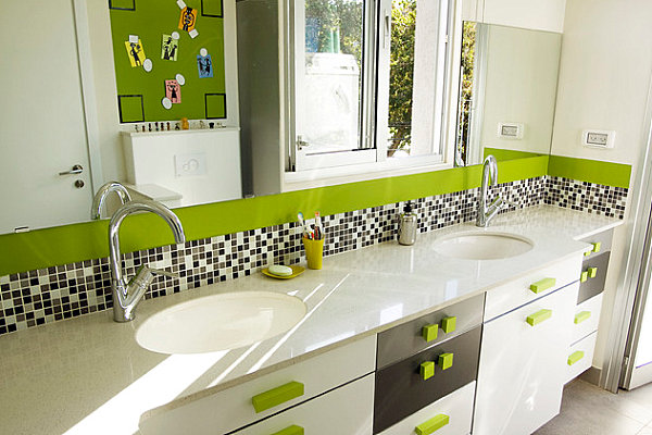 Green drawer pulls in a modern bathroom