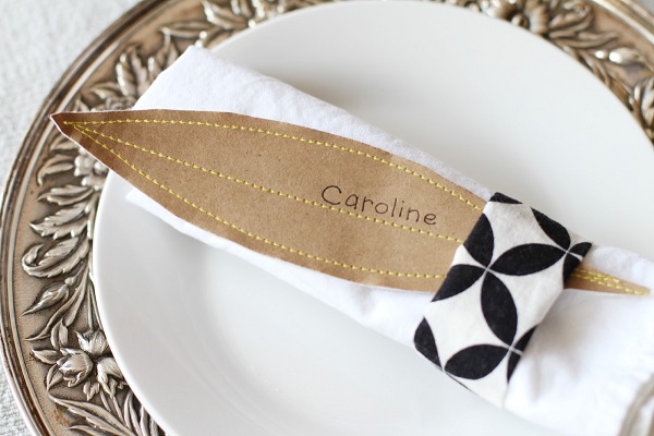 Leaf shaped place card with napkin holder