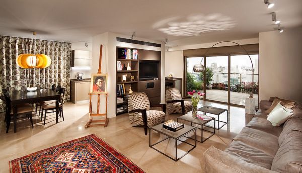 Lovely eclectic living room in earthen tones with the Arco