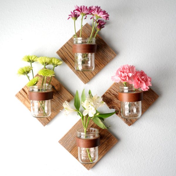 Mason jar sconces with fresh flowers