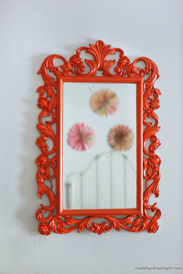 Ornate bright orange painted frame