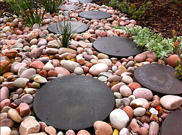 Pebbles and modern stepping stones on a pathway