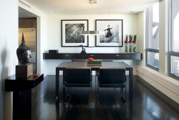 Sleek and stylish dining room with hints of red