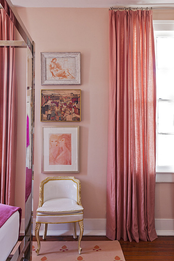 Trio of pictures in a pink bedroom