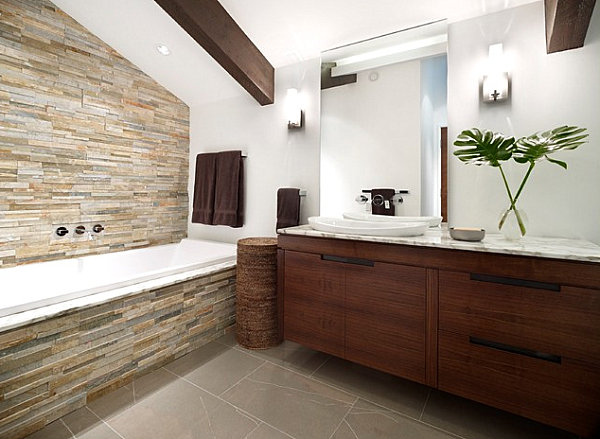 Tropical leaves in an earthy bathroom