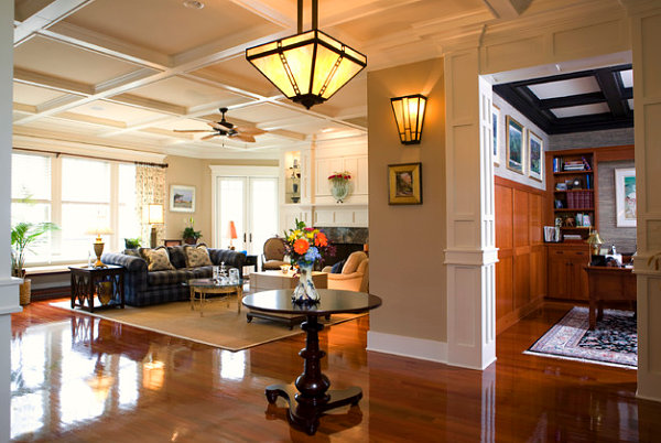 Warm lighting in a Craftsman-style entryway and family room