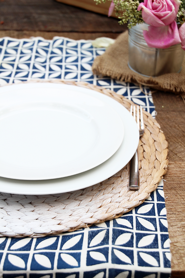 Woven circular placemat with ombre painting