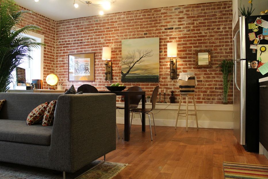 exposed brick walls in the living room