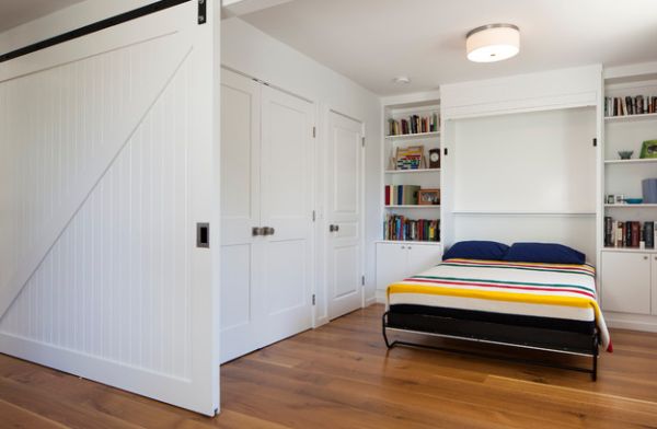 A sliding door and a Murphy bed help create a bedroom out of nothing!