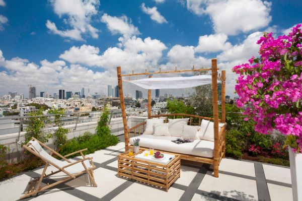 Bamboo frame daybed in the patio promises plenty of opulence