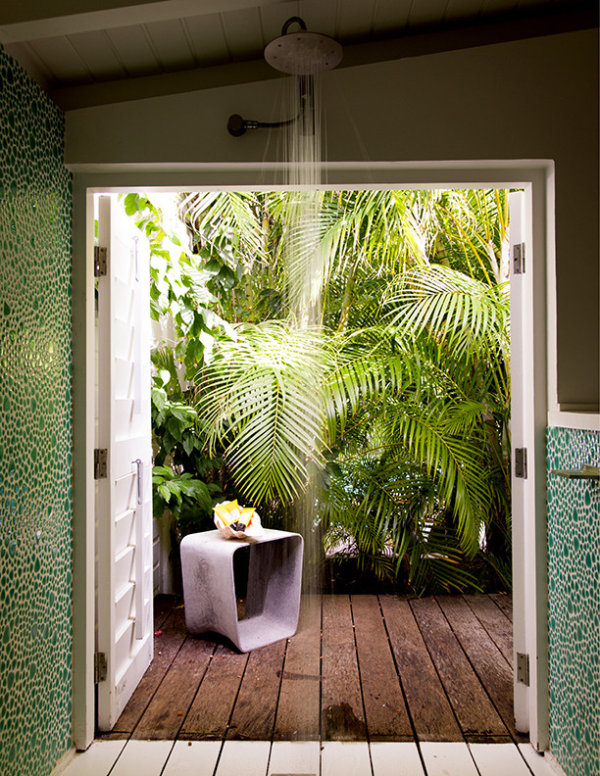 Bathroom with a tropical garden view