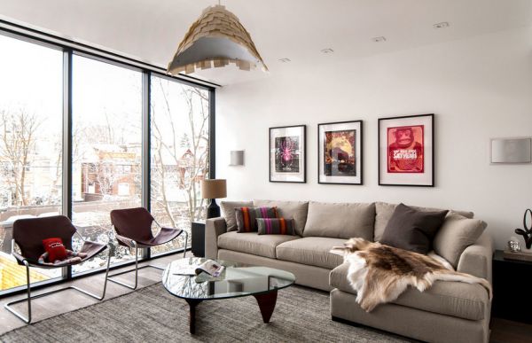 Beautiful contemporary living room with the Noguchi table and framed posters