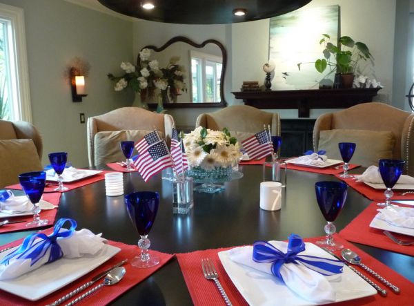 Beautiful glassware and an organized dining room with neatly placed flags