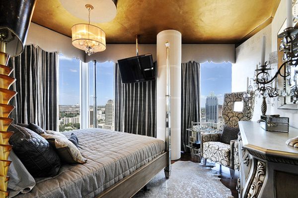 Ceiling with gold gives the bedroom a more spacious appeal