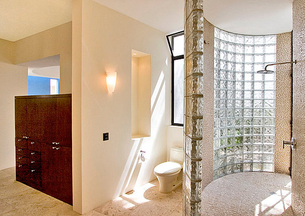 Curved shower space with glass block