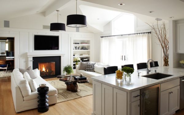 Dark accents in the living space are enhanced using stylish drum lights