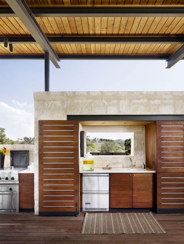 Elegant kitchen offers wonderful views of the low rolling hills in the distance