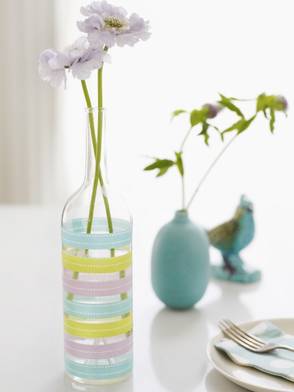 Glass vase with decorative tape stripes