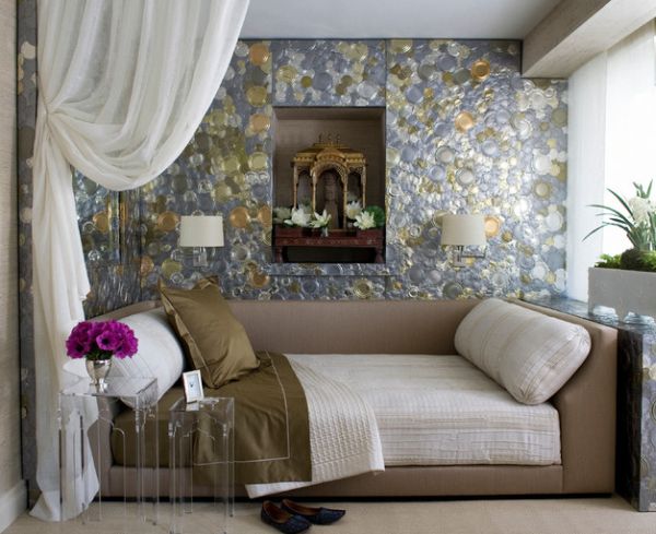 Glittering tin cans wall complements the daybed in neutral hues perfectly