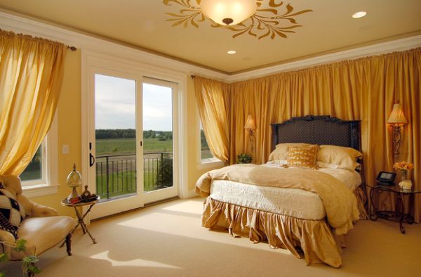 Gold-themed bedroom with sliding glass doors