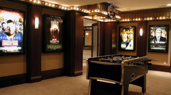 Gorgeous media room entry with illuminated posters - Exquisite!