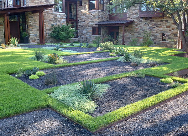 Gravel and grass define a contemporary yard