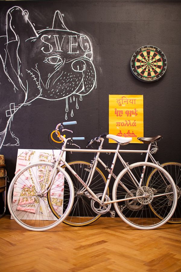 Large black board and interesting decor additions make for lively interiors