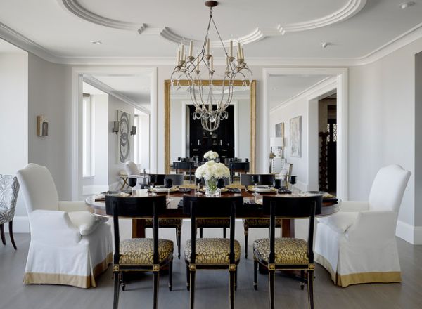 Modern dining space in white with a gash of golden hue