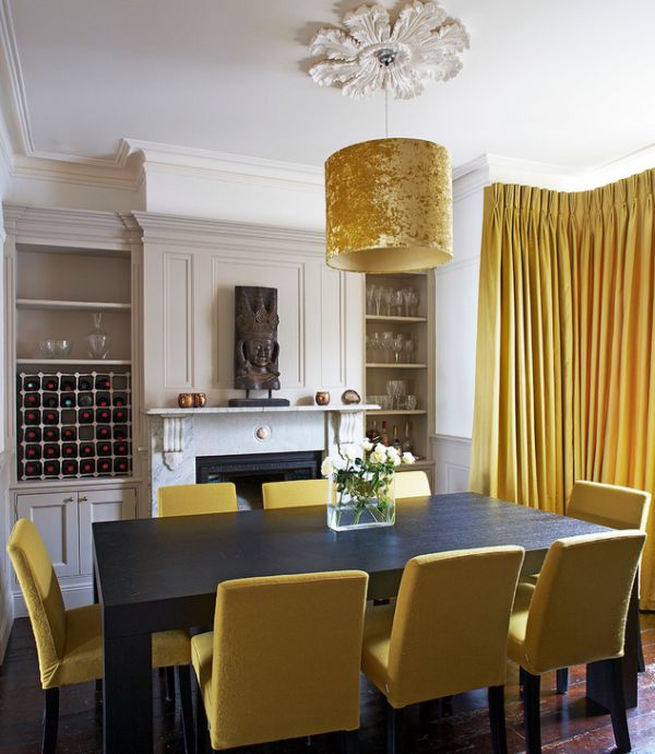 No shortage of golden surfaces in this dining space!