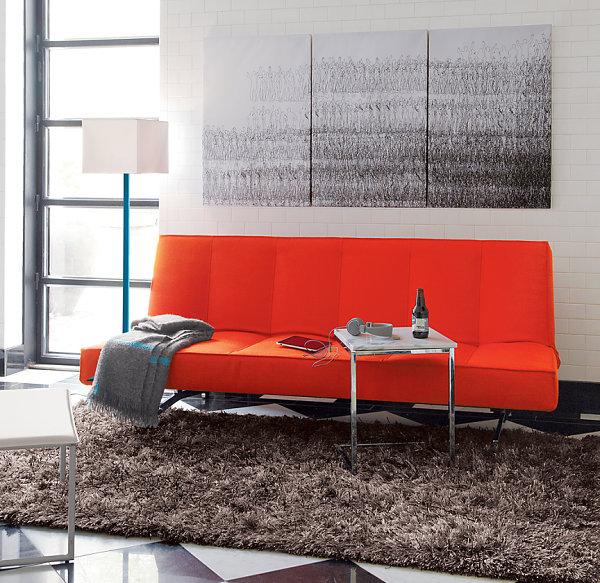 Orange sleeper sofa for compact accommodations