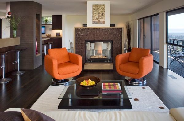 Oranges and yellows in the fruit bowl complement the chairs elegantly