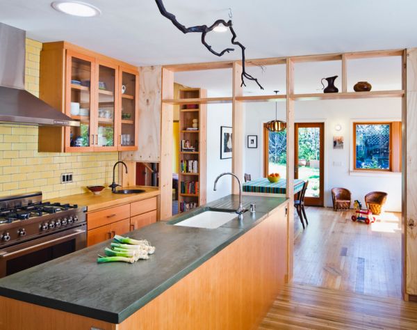 Recessed lighting used instead of pendant lights above the kitchen counter