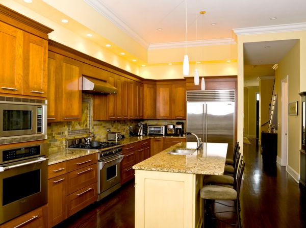 Simple recessed lighting offers functional illumination in the kitchen