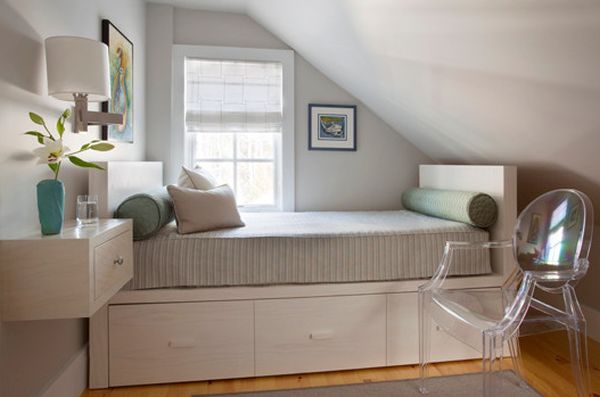 Storage underneath the bed and decor that does away with legs - Perfect for small bedrooms