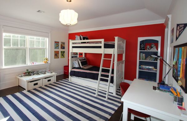 Striped carpet and accents of red for a trendy boys' bedroom