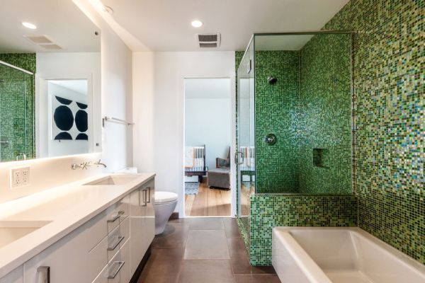 Stylish bathroom in green and white